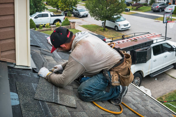Professional Roofing technician working in Chriesman, TX